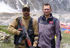 The Lithuanian and other climbers were protected by armed special Pakistan police unit officers