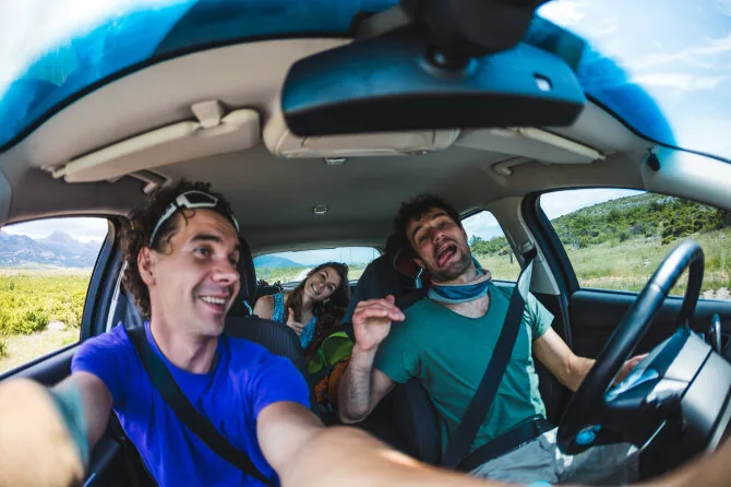 Shutterstock photo/Friends in a car