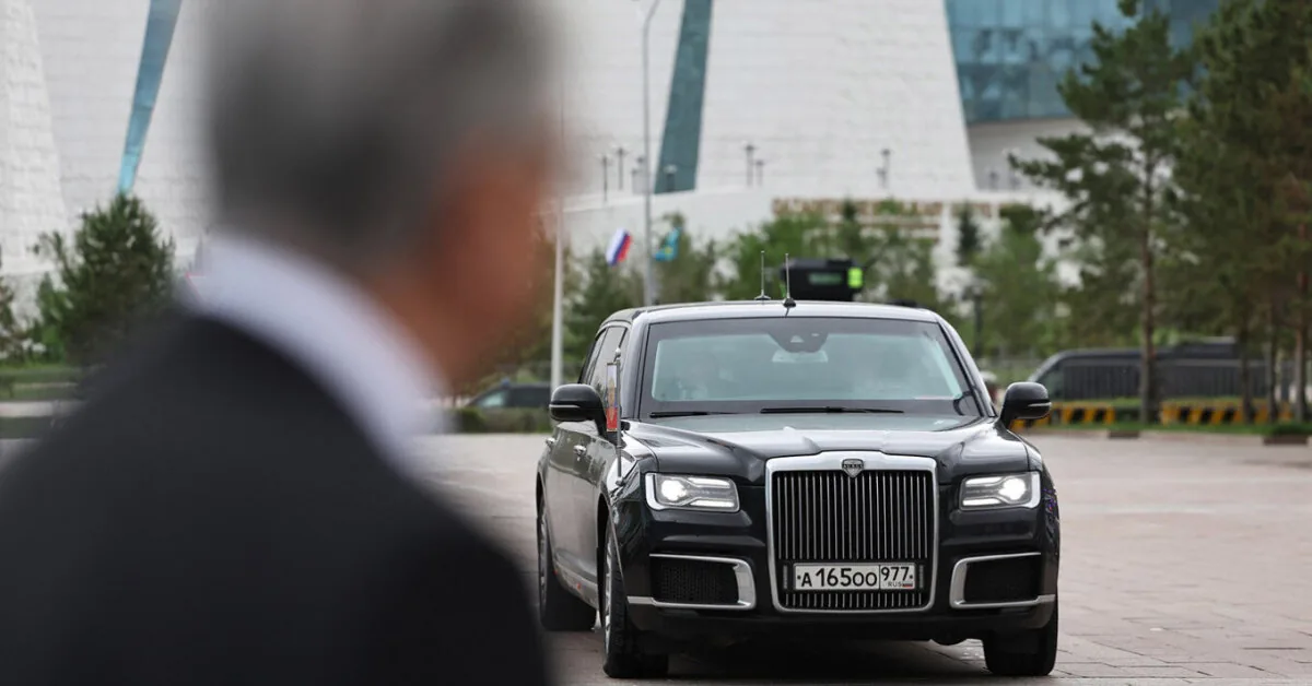 Putin is accompanied by a car with a ZU-23 anti-aircraft gun platform