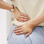Back pain after an active weekend: signs that cannot be ignored