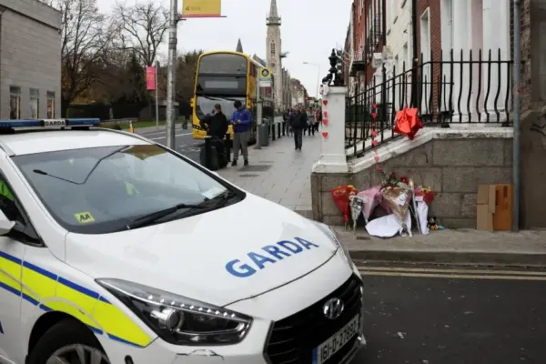 A woman wanted in Lithuania for sexual crimes against a child was found hiding in a wardrobe in the United Kingdom