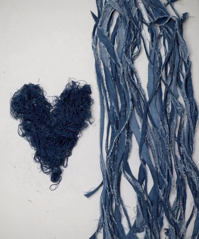 Personal album photo/Woven bags from denim strips are a calming activity for Milda.