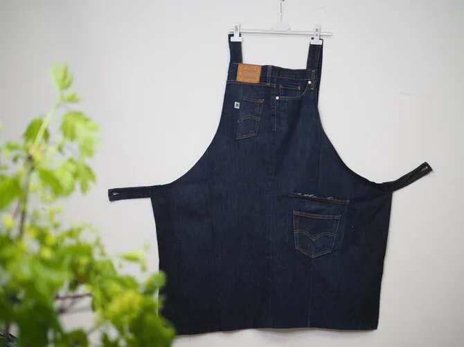 Personal album photo/Milda wears a denim apron during creative workshops and enjoys the original denim pockets that remain.