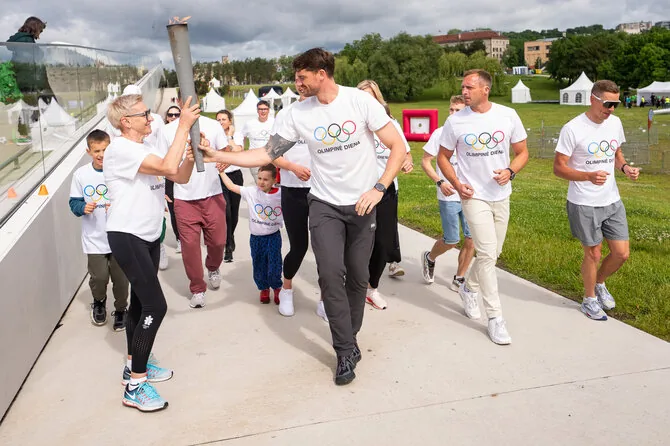 V.Dranginio/LTOK photo./Olympic Day takes place in Kaunas. Vida Vencienė, Saulius Ritteris, Mindaugas Griškonis