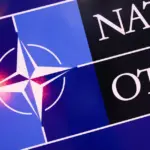 A Chinese-Canadian citizen who completed a NATO internship has been detained on suspicion of espionage