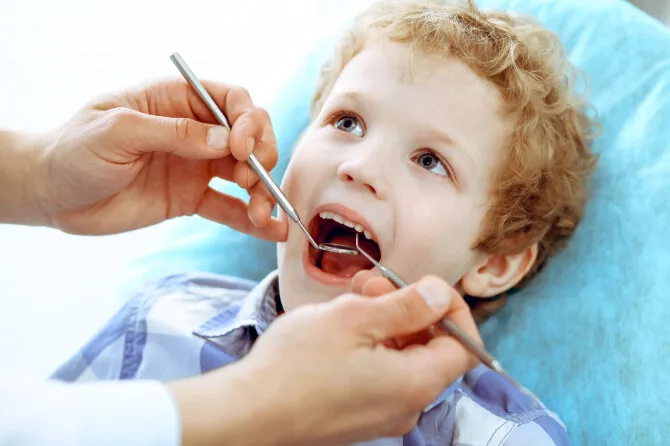 123RF.com photo/Child at the dentist