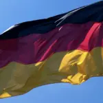 Germany's economy grew more slowly in the second quarter, inflation accelerated in June