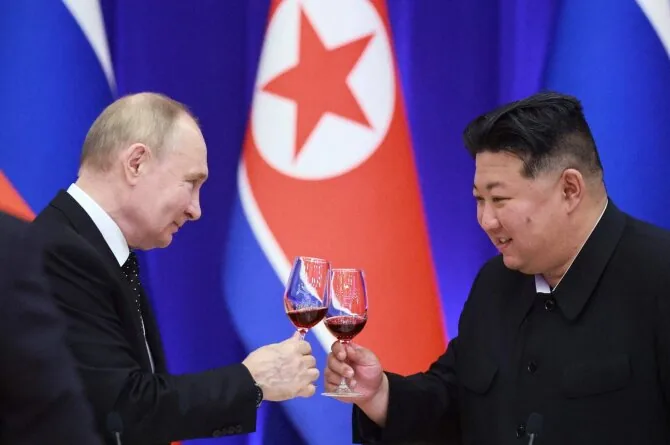 Vladimir Putin and Kim Jong Un / VLADIMIR SMIRNOV / AFP