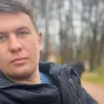 Pasakė, kad Putinas „bus išvestas su antrankiais“ ir papuolė už grotų