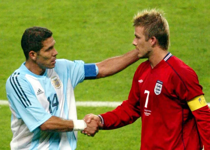 „Reuters“/„Scanpix“ nuotr./Diego Simeone ir Davidas Beckhamas