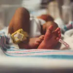 Did child rights defenders really try to take the body of a deceased baby?