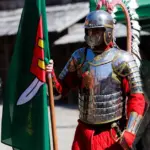 Speaking on the Day of the Land Forces in the Trakai Castle courtyard – the ceremony of handing over the march flags