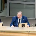 Taurimas Valius – awkward situation: the seat to the right of Sinkevičius is already taken