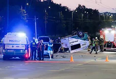 During the accident, the police car overturned onto its roof