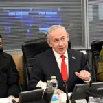 Israel warns it will respond with "full force" to any Iranian attack