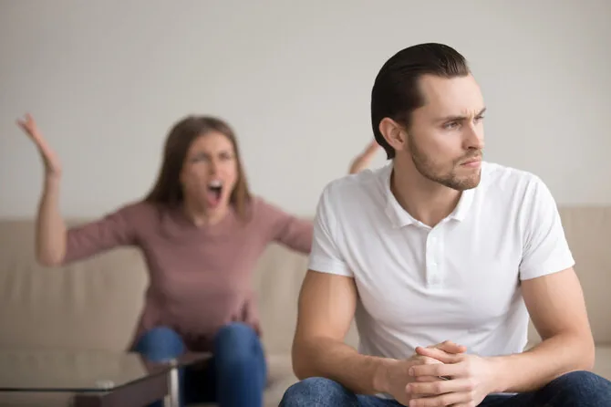 Shutterstock photo/Woman shouting at man