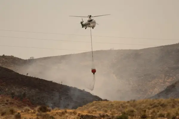 As Spanish firefighters finish fighting the wildfire, hundreds of residents are allowed to return home
