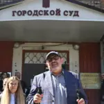 Russia fined a politician opposing the war in a chaotic court session
