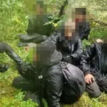 Lithuanian officers helped detain 55 migrants in a neighboring country