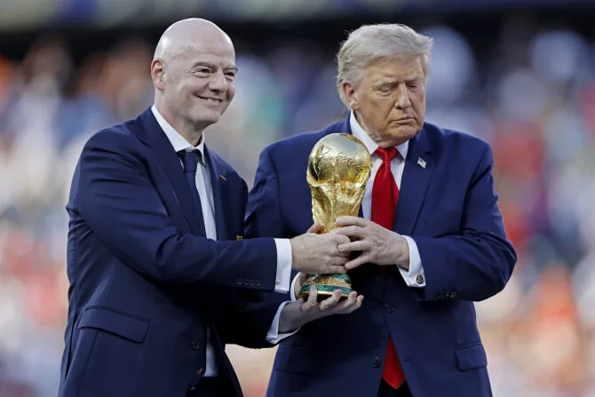 „Scanpix“ nuotr./Gianni Infantino ir Donaldas Trumpas