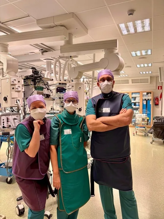 Santaros klinikų nuotr./Atviro arterinio latako minimaliai invazinė procedūra (Aušrinė Pliauckienė, Asta Bliūdžiūtė, Sigitas Čėsna stažuotėje Suomijoje)