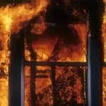 A residential house was on fire: windows cracked from the heat, had to dig through the ashes