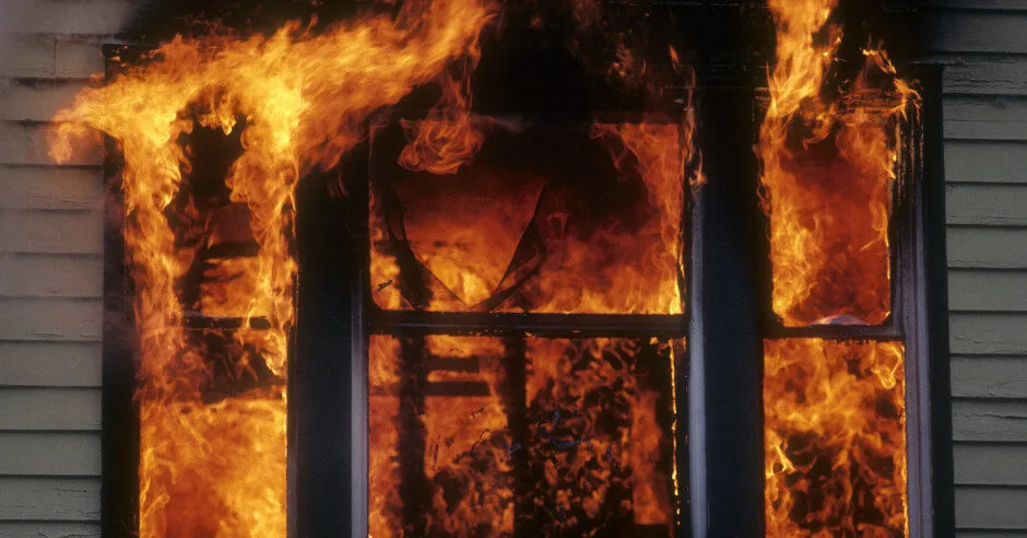 A residential house was on fire: windows cracked from the heat, had to dig through the ashes