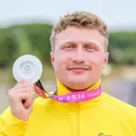 Mykolas Alekna, who grabbed the silver, also managed a smile