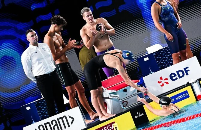 LTU Aquatics/Dariaus Kibirkščio nuotr./Europos plaukimo čempionato akimirka. Danas Rapšys, Tomas Navikonis, Ieva Jurkūnaitė, Sylvia Statkevicius,