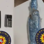 A blue package was noticed on the fence
