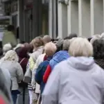 Huge queue: people flock for heating subsidies