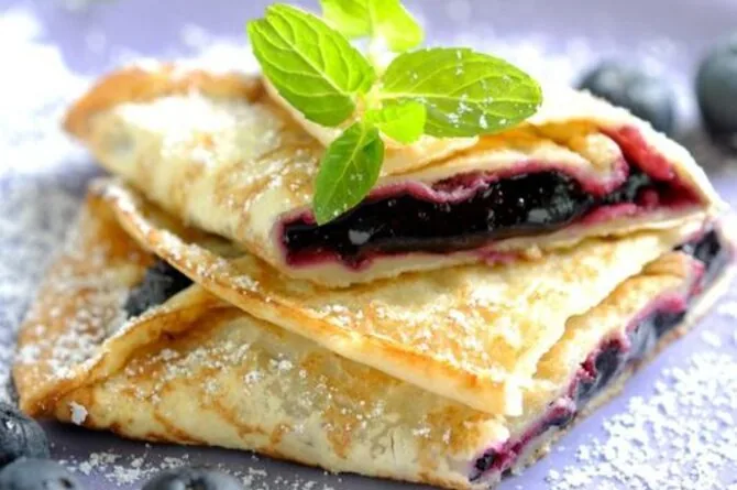Crepes with blueberry jam