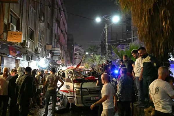 Two people died and 13 were injured in a minibus explosion near the Syrian capital