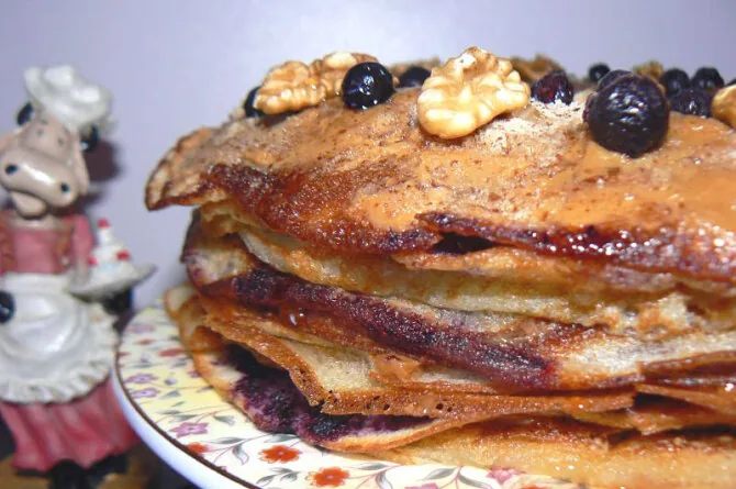 Pancake cake with nuts and blueberries