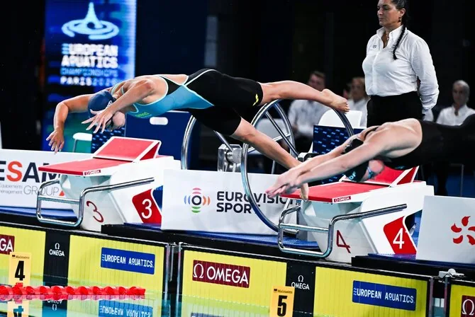 LTU Aquatics/Dariaus Kibirkščio nuotr./Kotryna Teterevkova ir Ralina Giliazova.