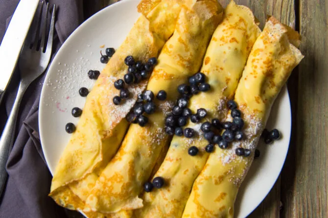 Crepes with curd cheese and berries