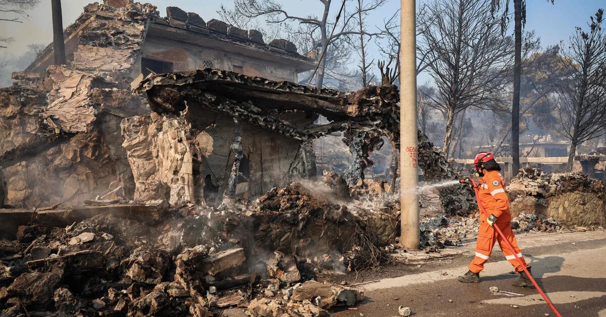 Two people died and hundreds were evacuated due to fires on an island near Athens, Greece