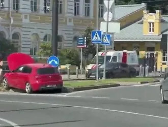In Vilnius, after a collision with a "Lexus," a BMW climbed onto the curb