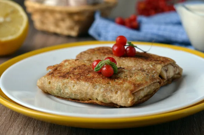 Crepes with mushroom filling