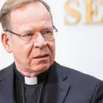 Archbishop of Vilnius says he spoke with one of the victims in the case of a priest accused of pedophilia