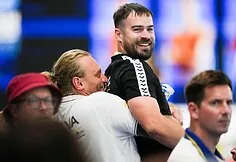 Tomas Navikonis won silver. Coaches Paulius Povilinis and Giedrius Titenis
