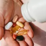 Why does a doctor, upon hearing that you constantly feel tired, hesitate to recommend vitamins?