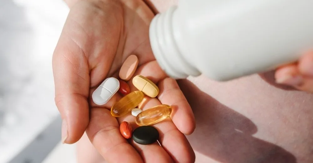 Why does a doctor, upon hearing that you constantly feel tired, hesitate to recommend vitamins?