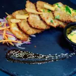 Don't know what to do with your zucchini harvest? This recipe will turn them into the crispiest "schnitzel"