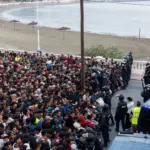 In the Spanish enclave of Ceuta, police are relocating migrants from the beaches