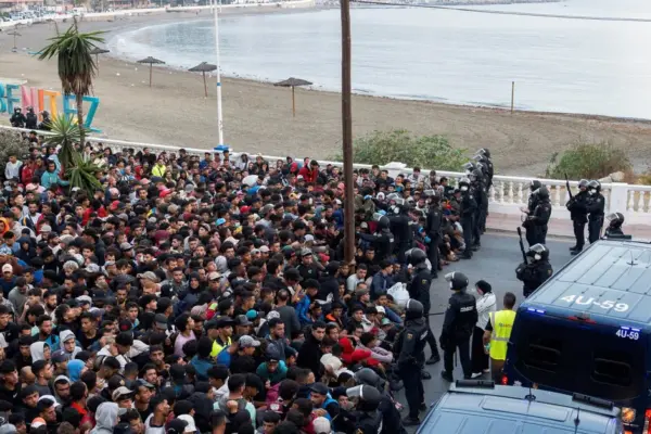 In the Spanish enclave of Ceuta, police are relocating migrants from the beaches