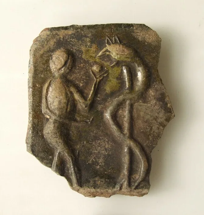 LNM photo / Tile with the scene of Eve by the tree of knowledge. 15th century.