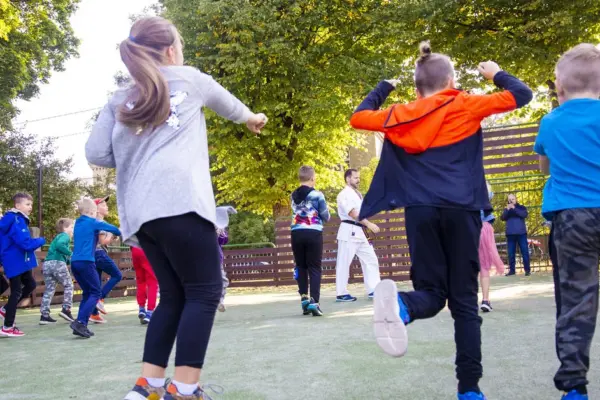 Students will participate in the sports and arts festival "Adamkiada," dedicated to the 100th anniversary of Valdas Adamkus