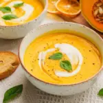 Autumn queen on a plate: creamy pumpkin and apple soup with crispy bacon
