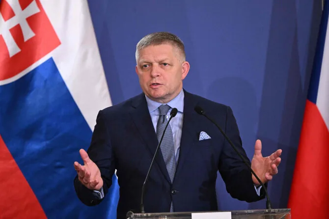 R. Fico / ATTILA KISBENEDEK / AFP